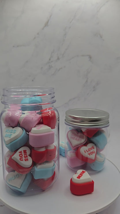 Video demonstration of 3D printed conversation heart fidget clicker showing clicky sensory toy in action colorful Valentine's Day heart-shaped stress relief fidget toy keychain gift